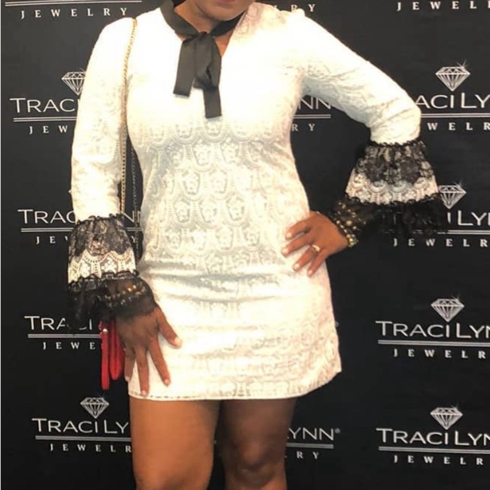 Mika & Gali off White Lace Dress with Black lace Accents and tie Bow at neck